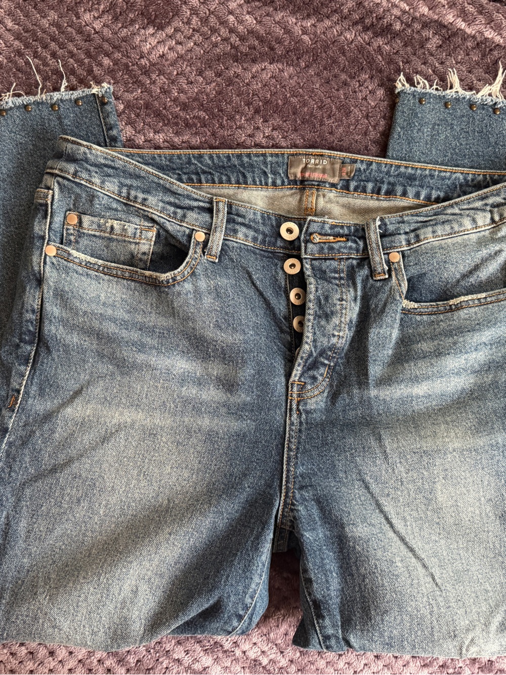 torrid Medium Wash High-Rise Button Fly Jeans with Frayed Hem stud detailing